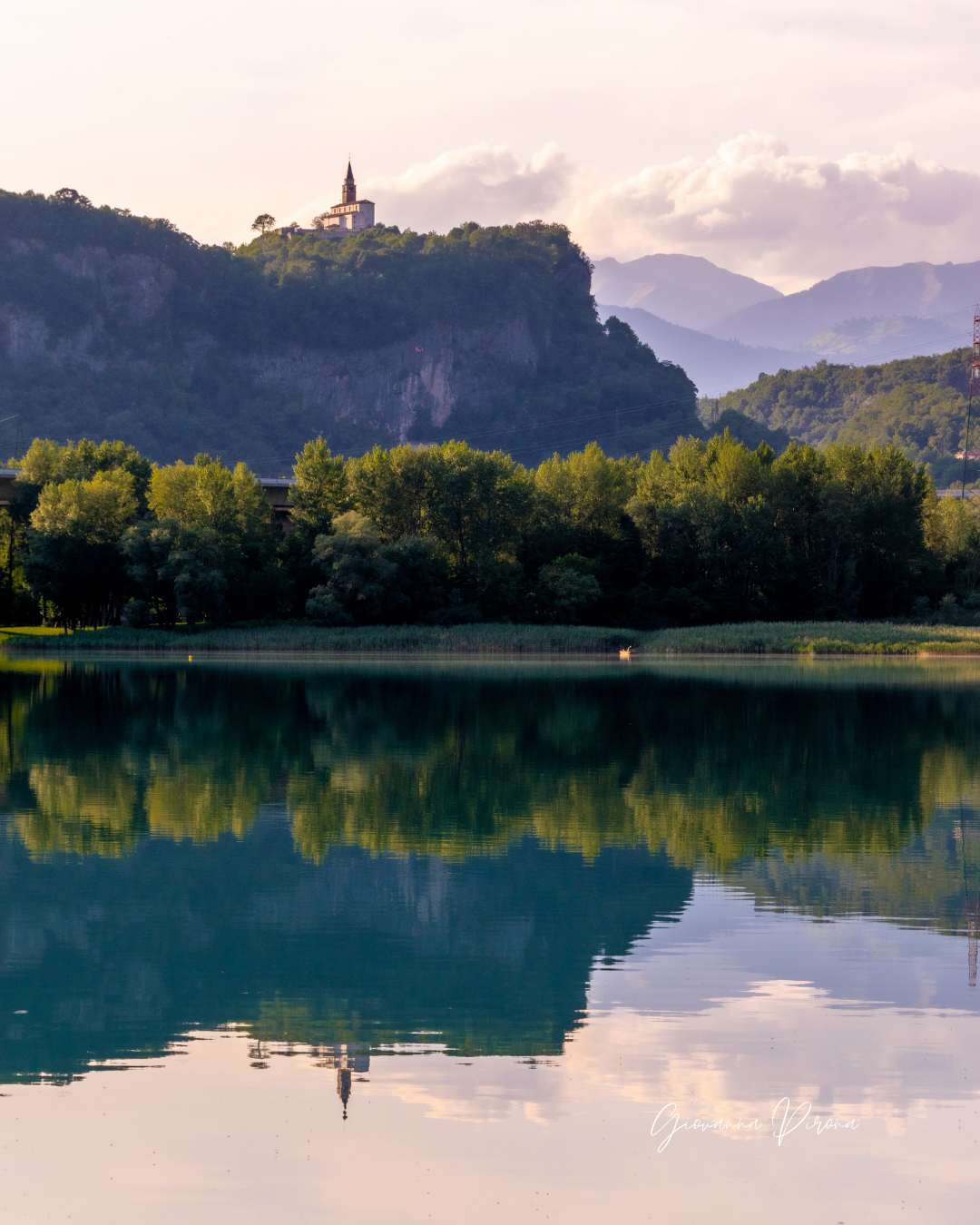 Pieve di Cesclans vista dal Lago di Cavazzo